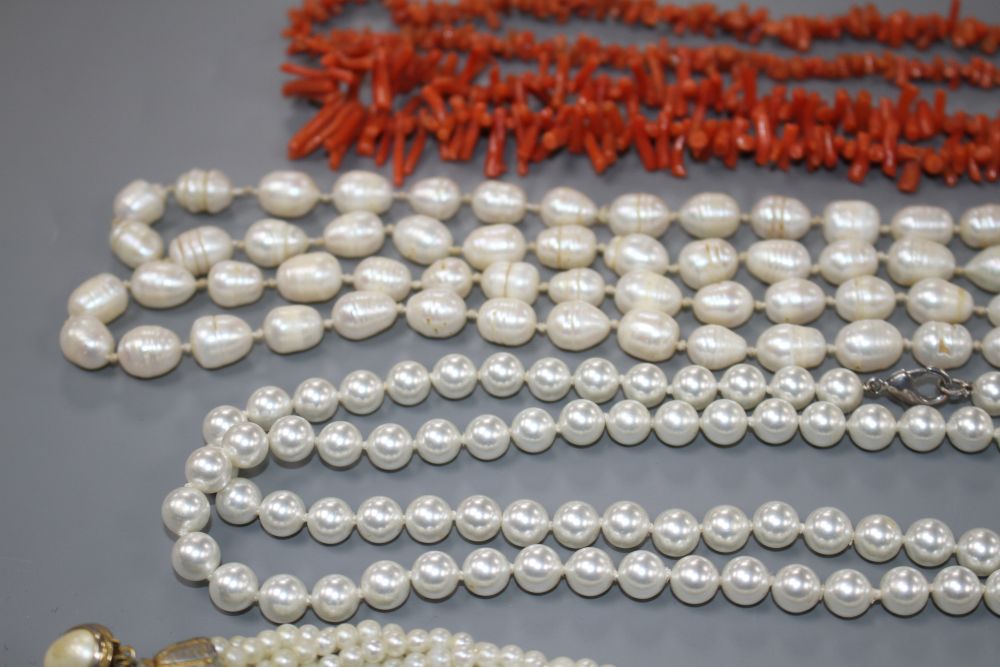 Two coral stick bead necklaces, a freshwater pearl necklace and three other costume necklaces,